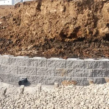 Poured concrete retaining wall St. Louis MO BTS Outdoor Solutions